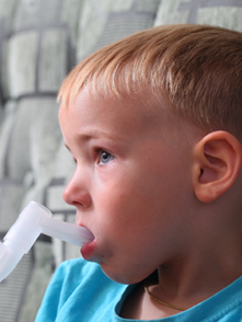 Child With Inhaler