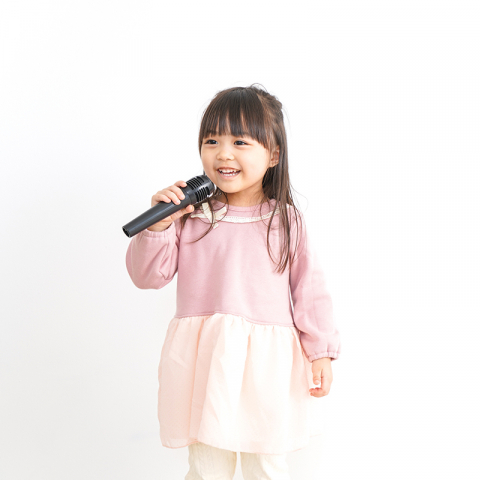 child with microphone