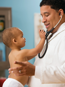 Doctor Making Infant Smile